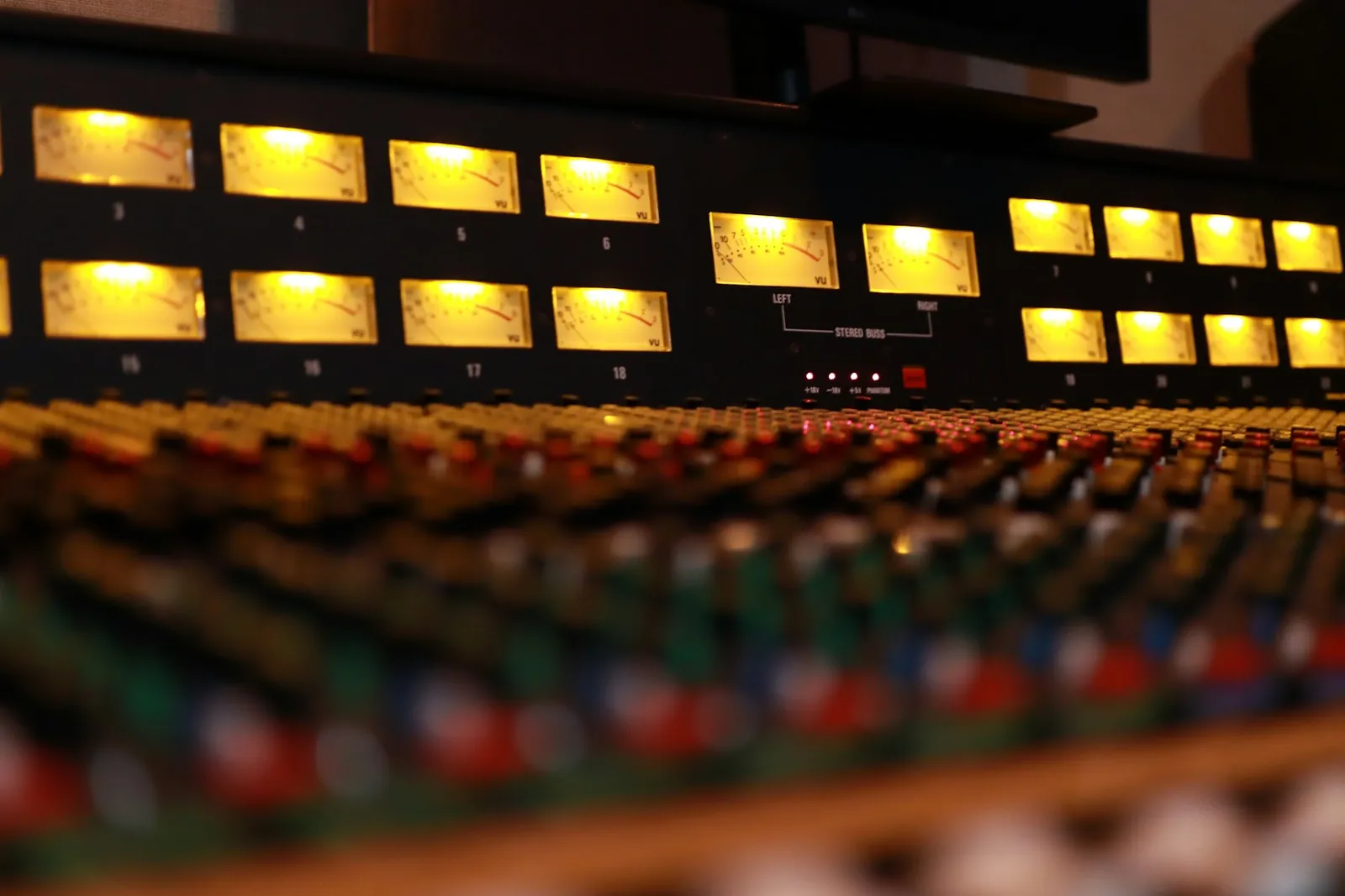 Studio level meters on a mixing console
