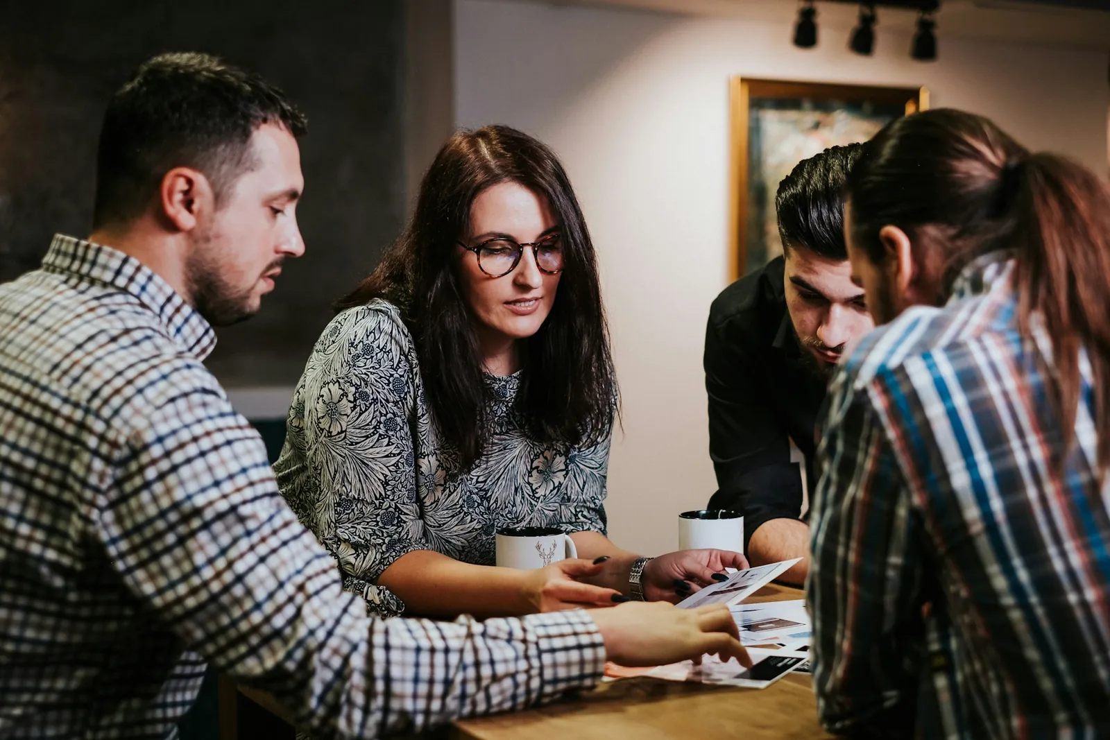 Our team reviewing a project together at a table